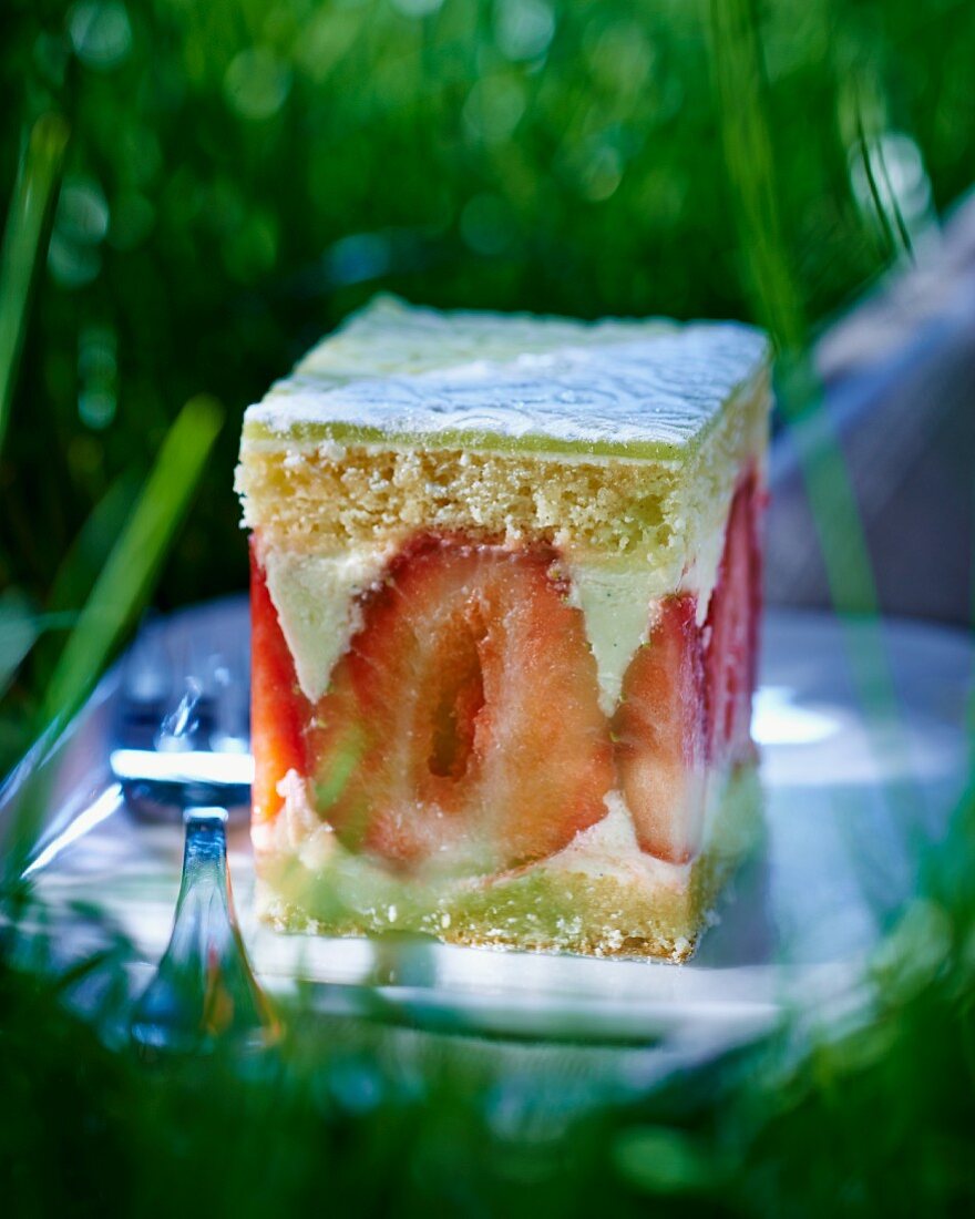 A slice of strawberry and buttermilk layer cake