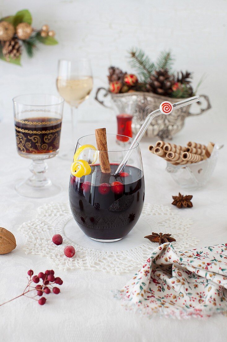 Glass of Mulled Wine in Christmas Setting