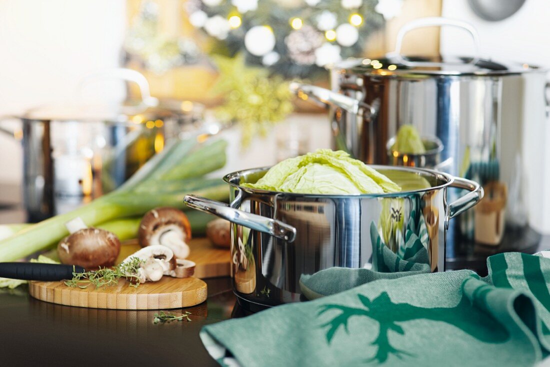 Preparations for a Christmas meal with savoy cabbage and button mushrooms