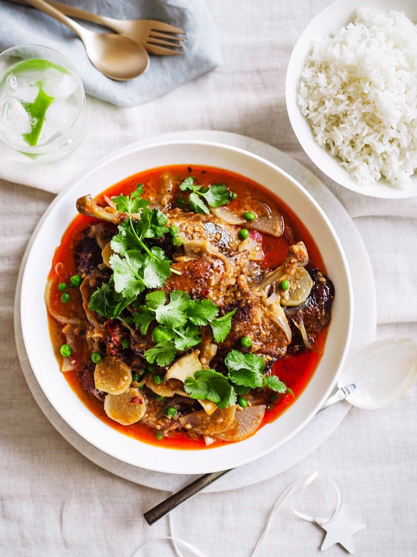 Red duck curry with coriander and rice for Christmas