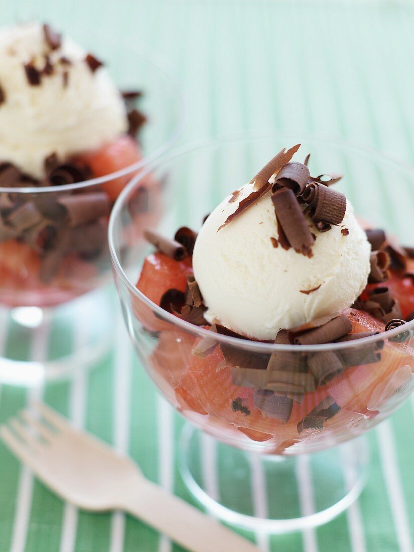 Watermelon Topped with Scoops of Vanilla Ice Cream and Chocolate Shavings in Dessert Bowls