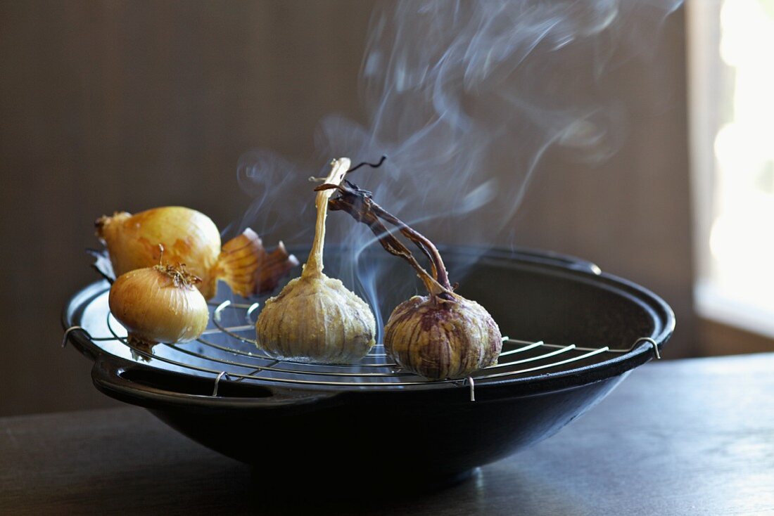 Onions and garlic being smoked