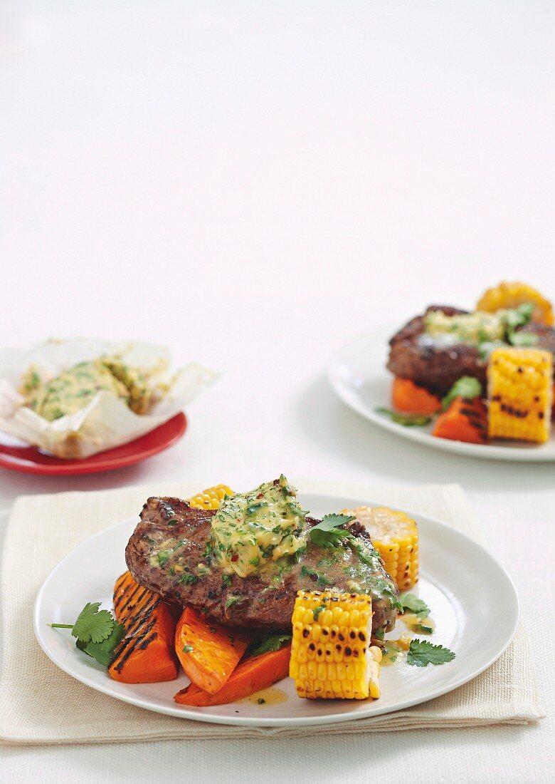 Rump steak with chilli butter on barbecued vegetables