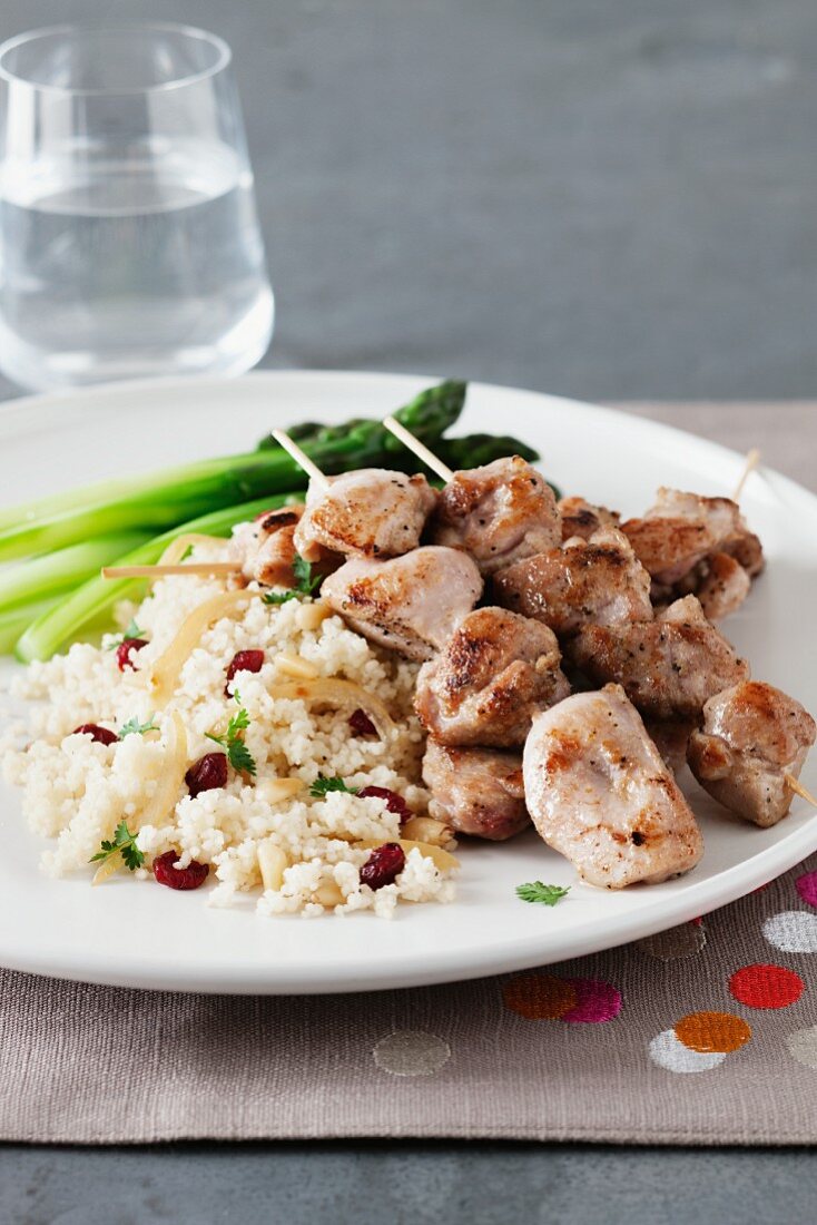 Chicken kebabs with asparagus and couscous