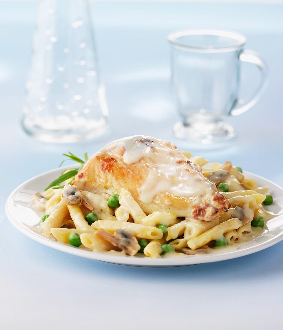Chicken breast with a creamy sauce and pasta