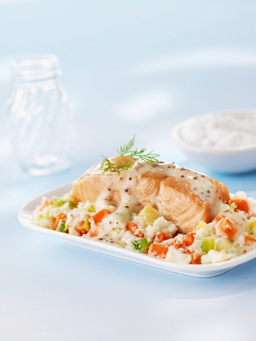 Salmon fillet with mustard sauce and vegetable rice