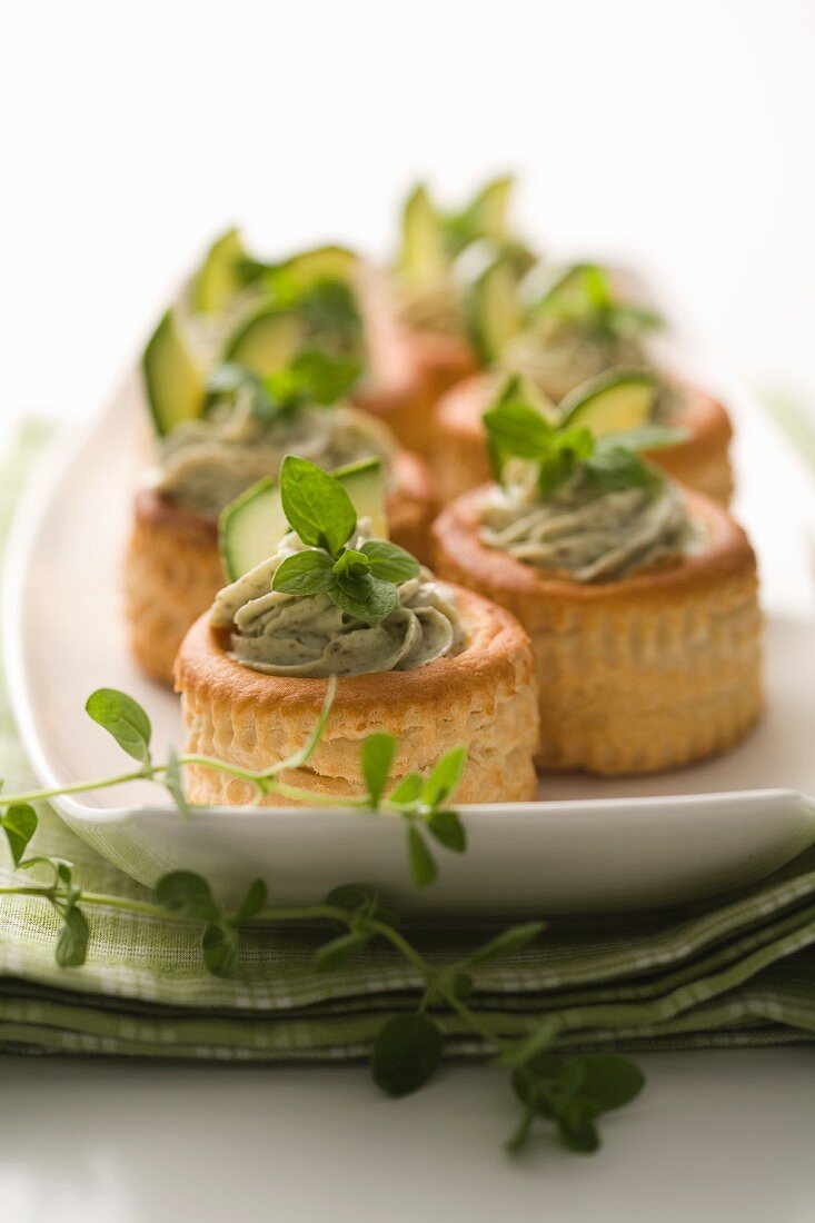 Vol-au-vents filled with courgette and herb paste