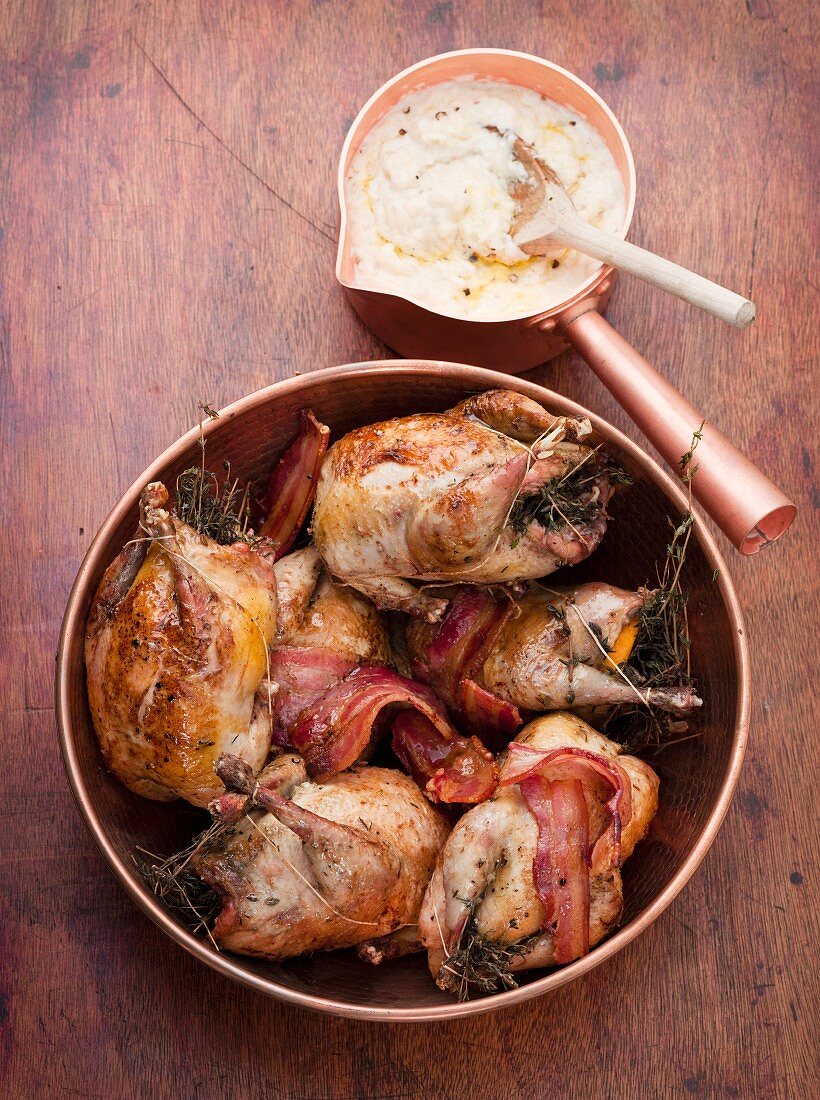 Stuffed partridges wrapped in bacon