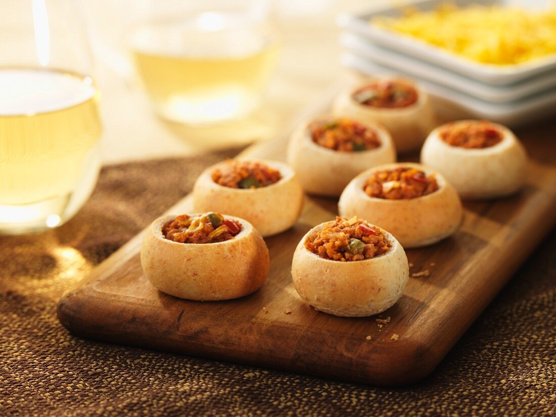 Chilli con carne served in hollowed-out bread rolls