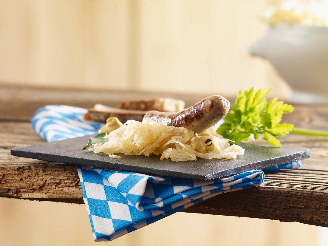Grilled bratwurst sausages with sauerkraut