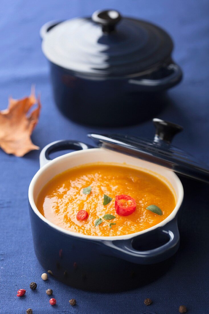 Squash soup with sliced chillies and thyme