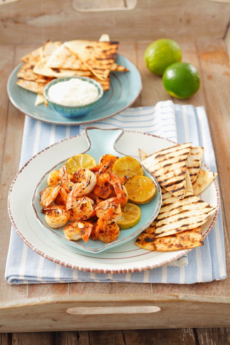 Grilled prawns with limes, flour tortillas and aioli