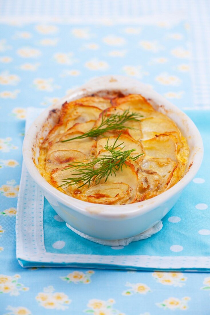 Potato gratin with fennel leaves