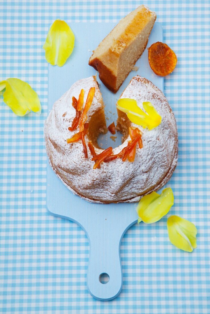 Babka (Easter cake, Poland) with icing sugar and crystallised orange peel