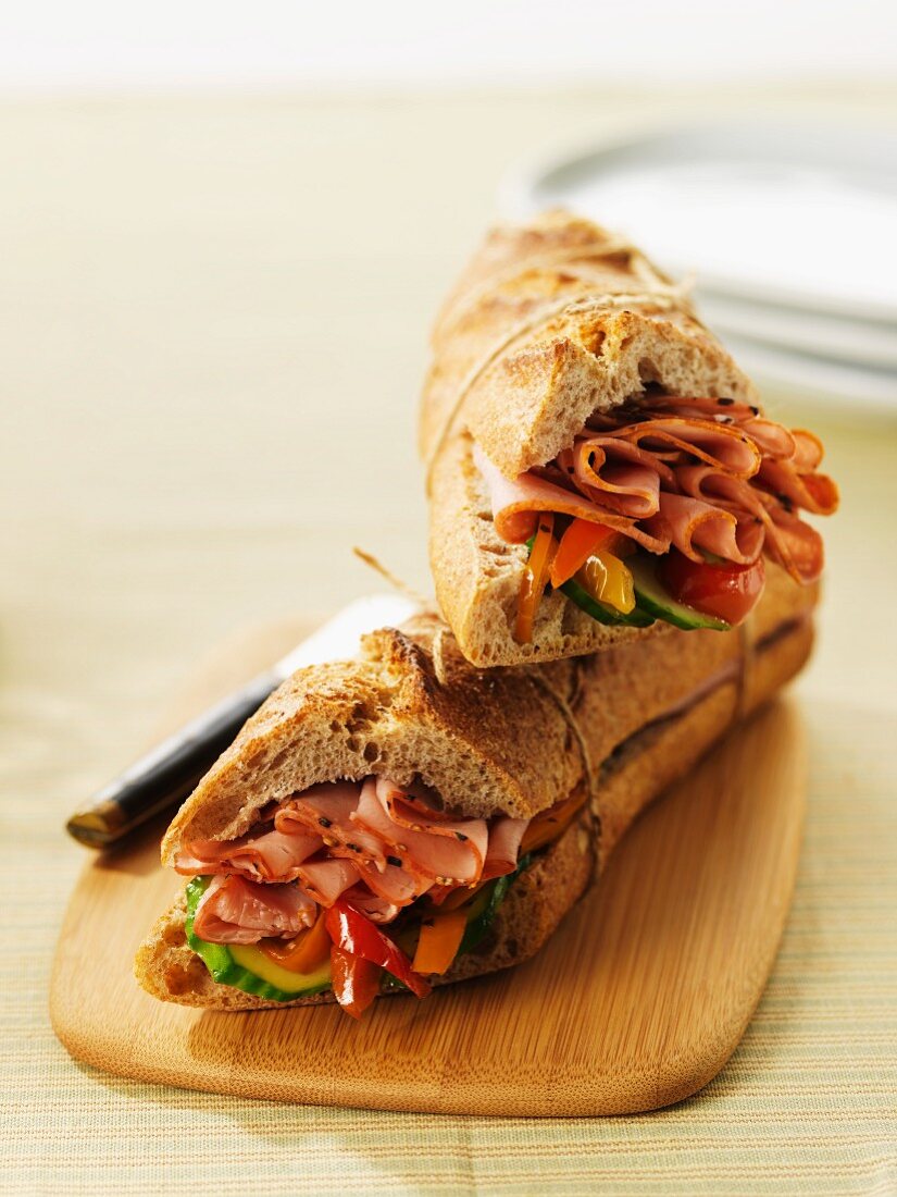 A baguette sandwich filled with pastrami