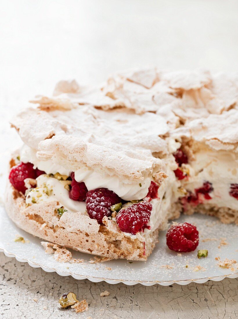 Meringue layer cake with raspberries and rosewater