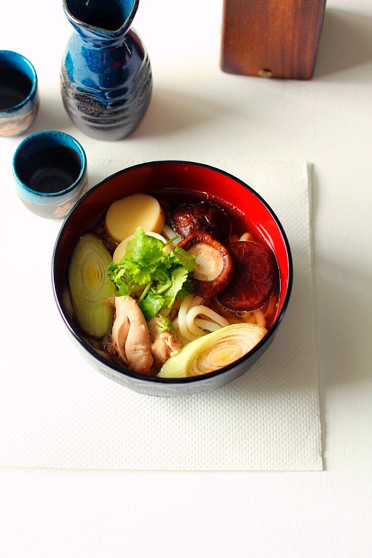 Japanese noodle soup with udon noodles and chicken