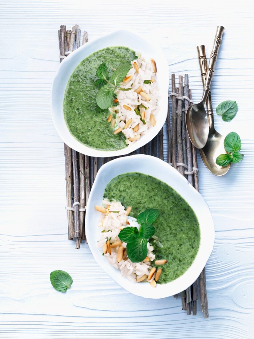 Spinach and coconut soup with pine nuts