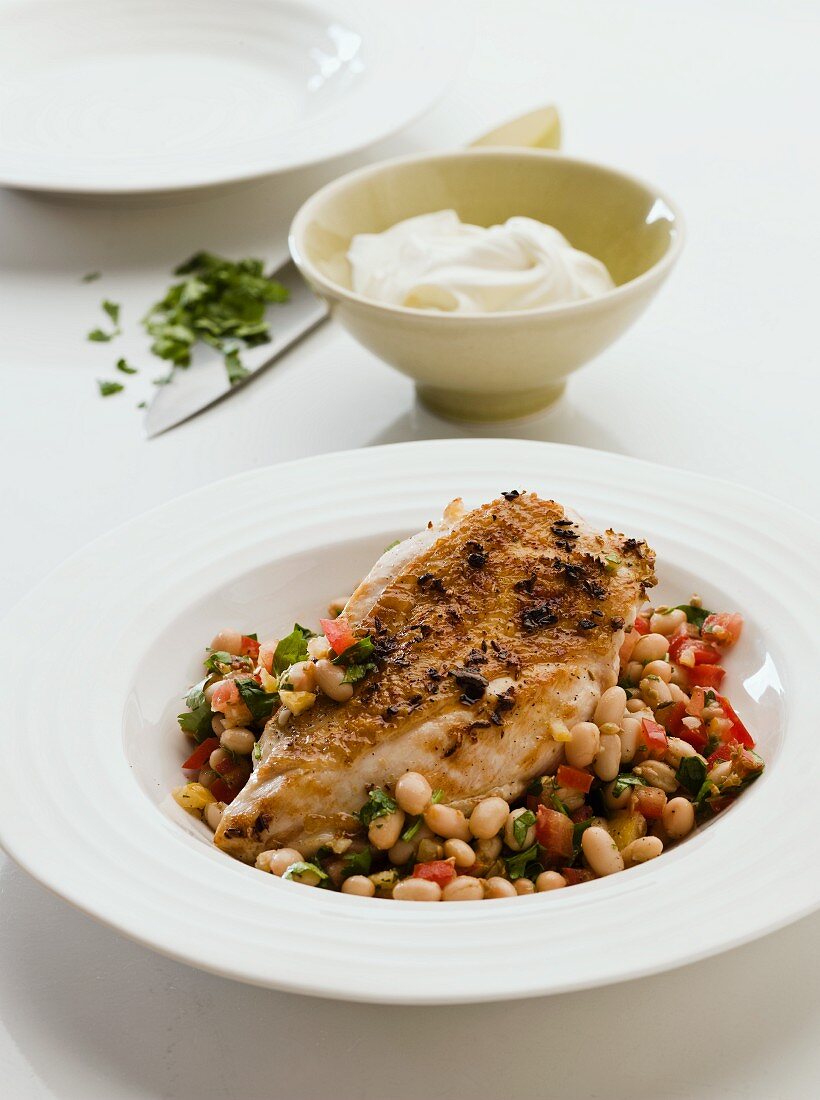 Chicken breast with white beans and yoghurt (Morocco)