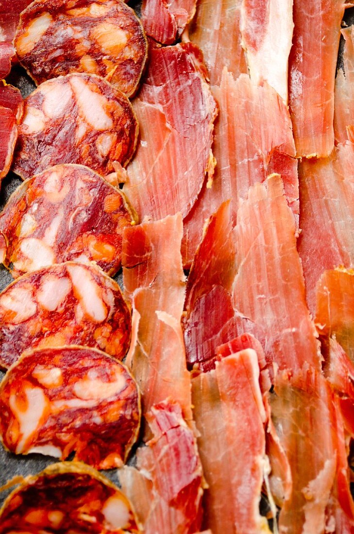 Thinly sliced Spanish Serrano ham, chorizo and lomo