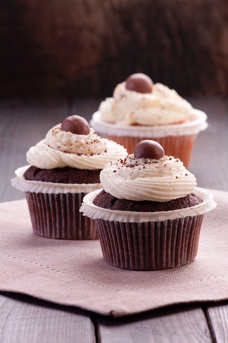 Chocolate cupcakes with chocolate beans