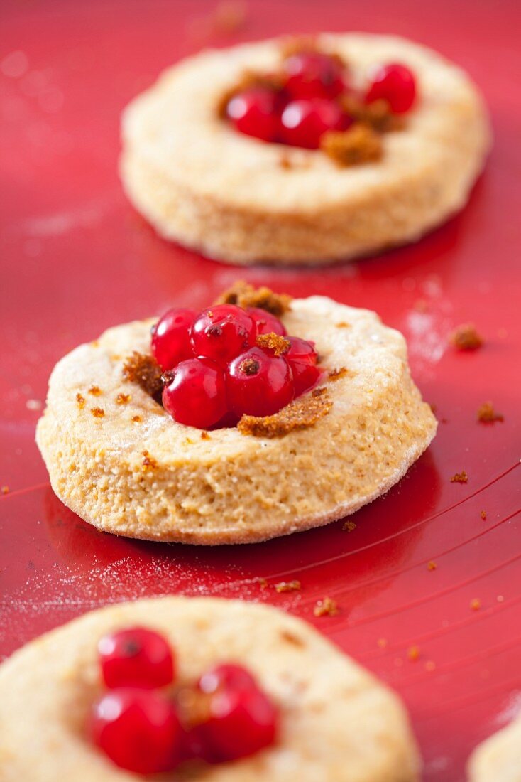 Unbaked wholemeal scones with redcurrants