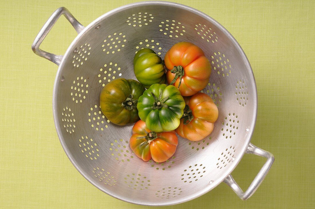 Beef tomatoes in a colander