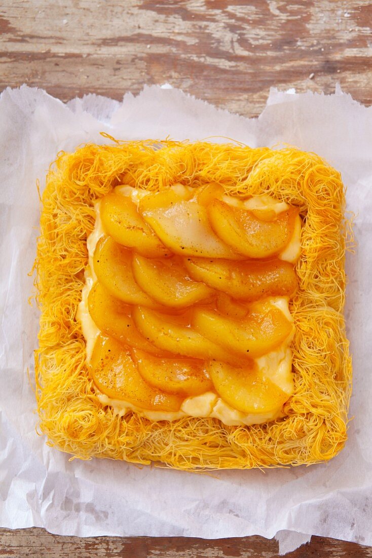 Kadaifi pastry tart filled with custard and pears