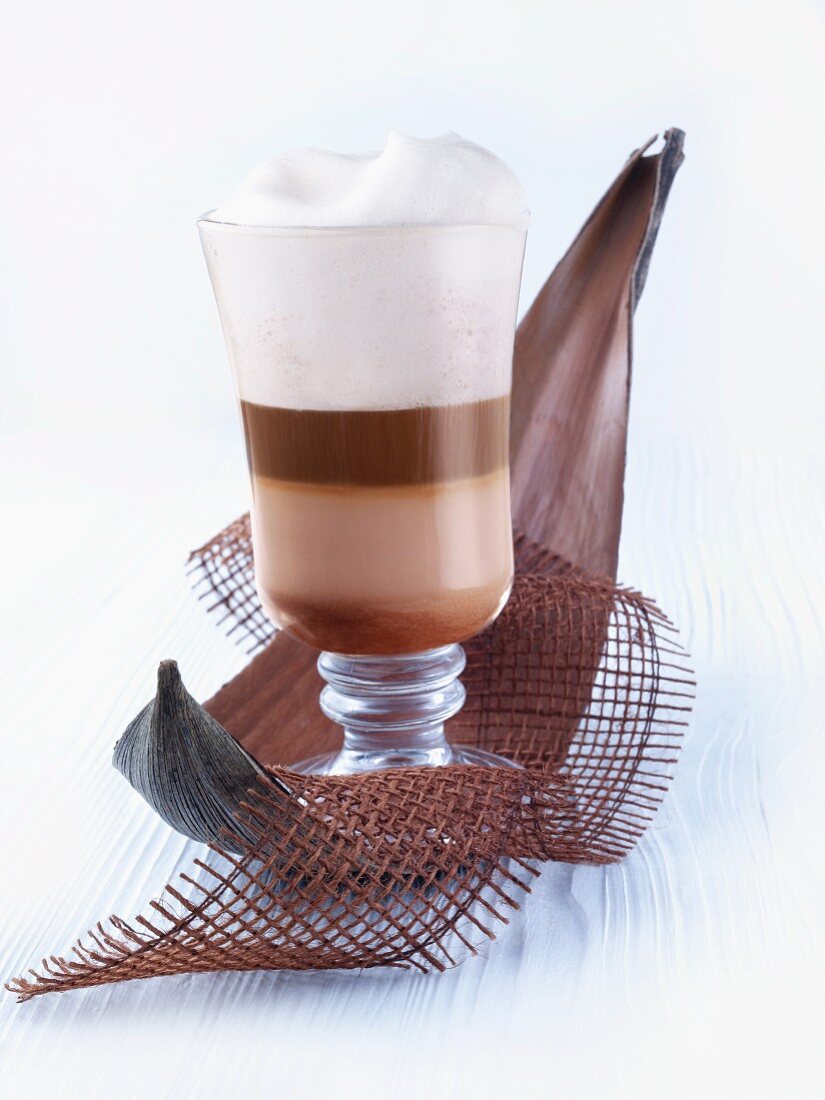 Coffee with chocolate and milk foam