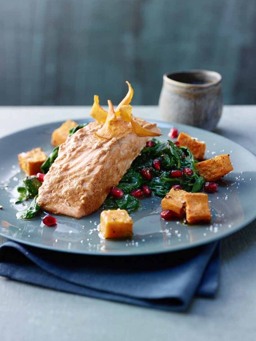 Salmon tikka masala with spinach and pomegranate seeds
