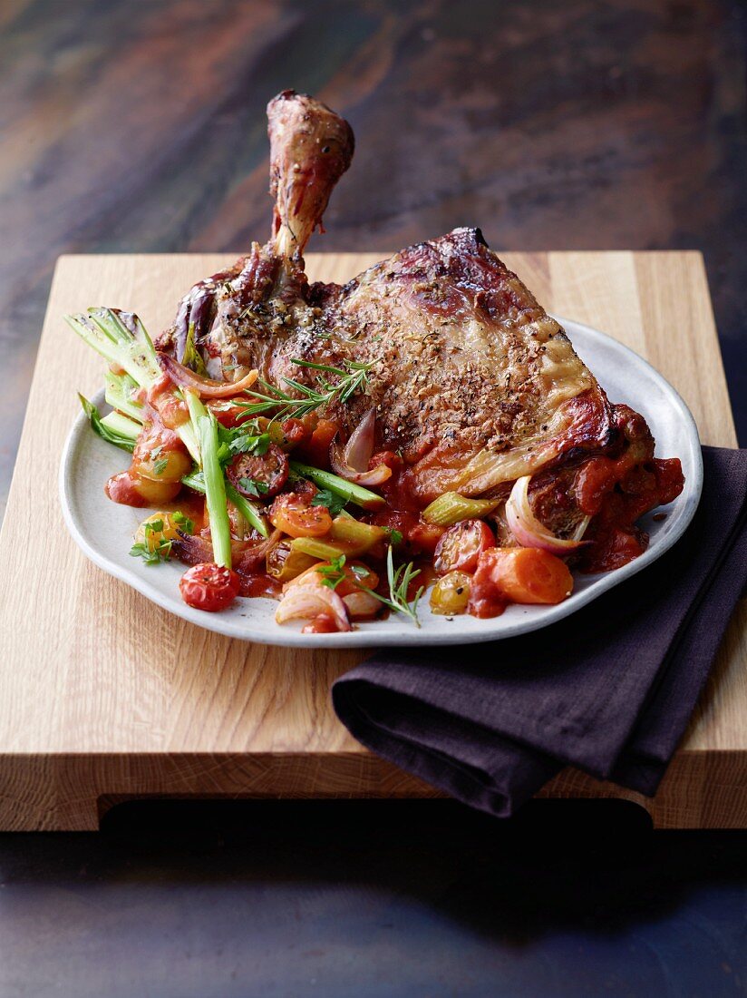 Lamb shoulder with tomatoes and rosemary