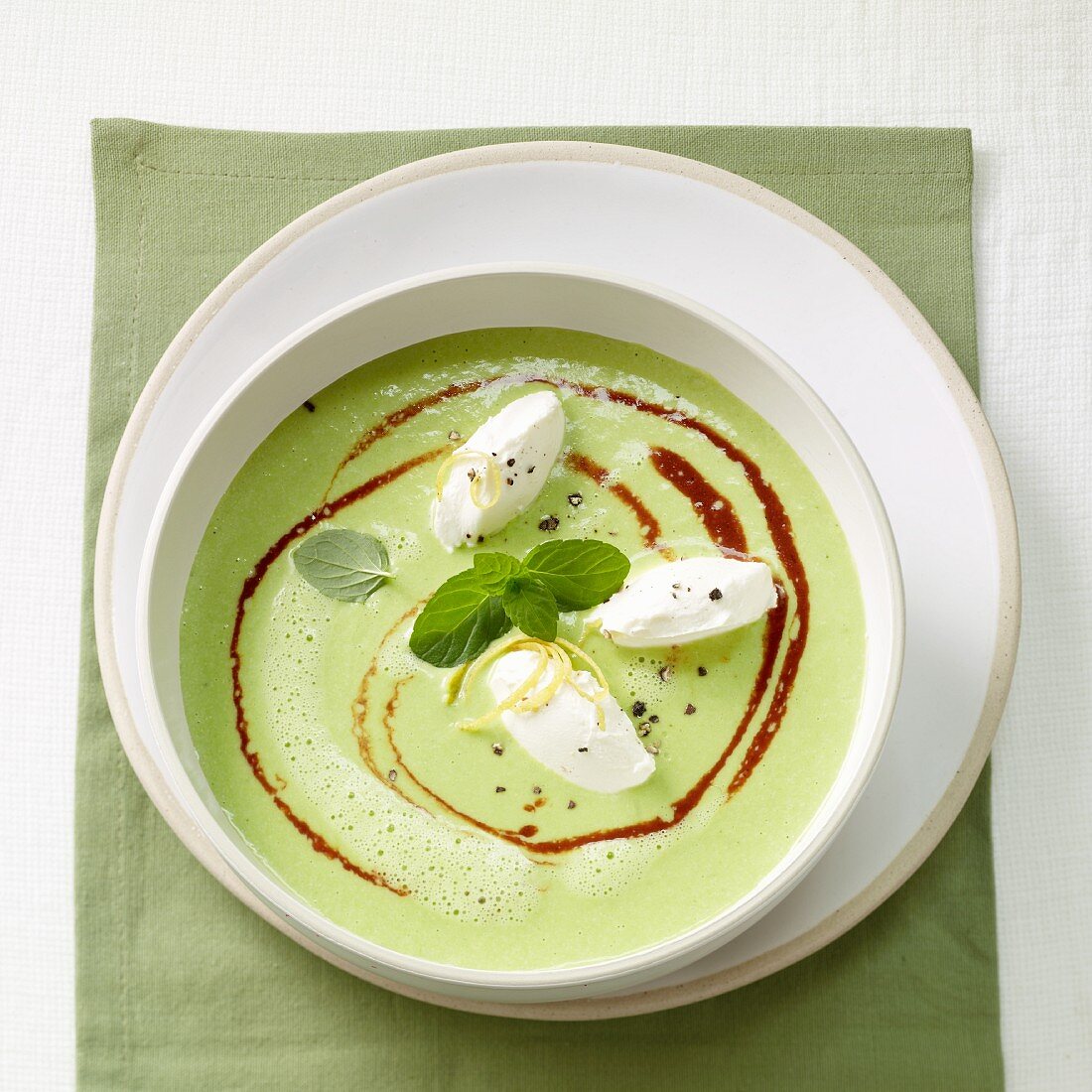 Pea-mint soup with cream cheese dumplings