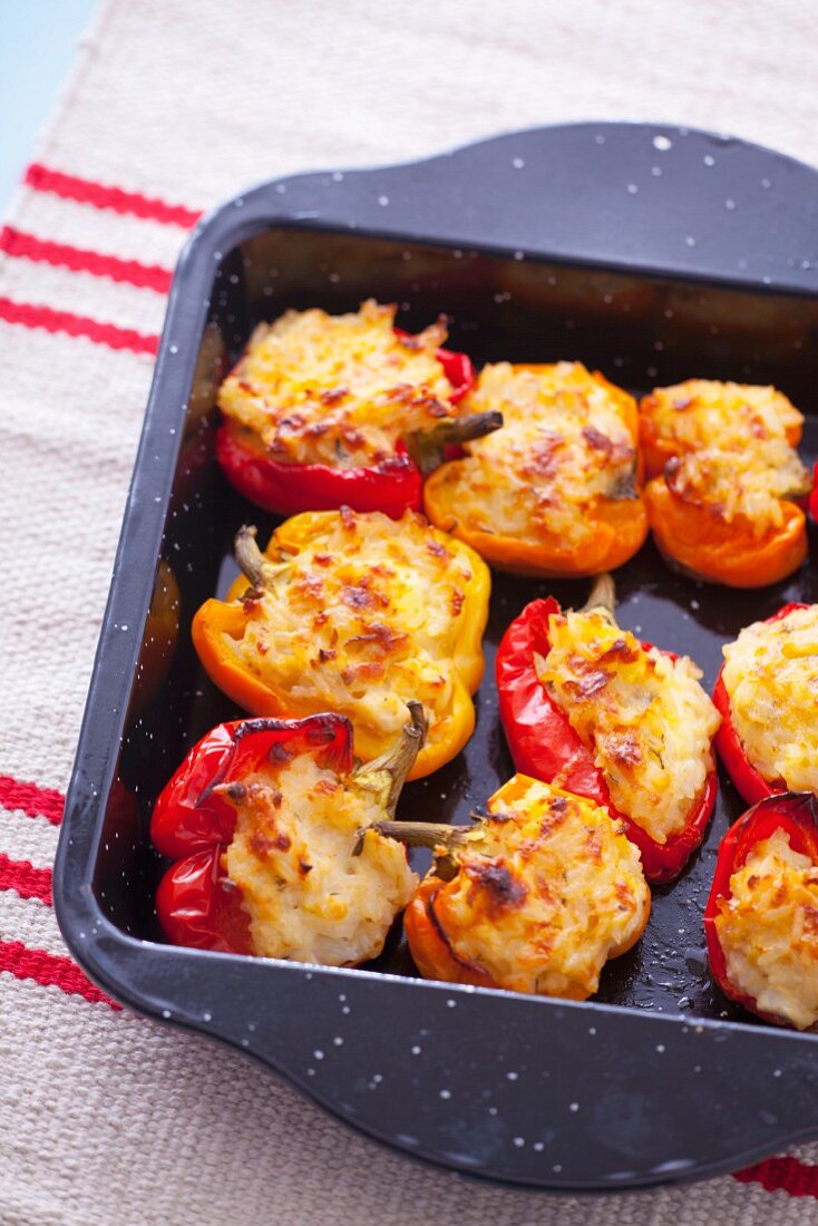 Red peppers stuffed with rice and cheese