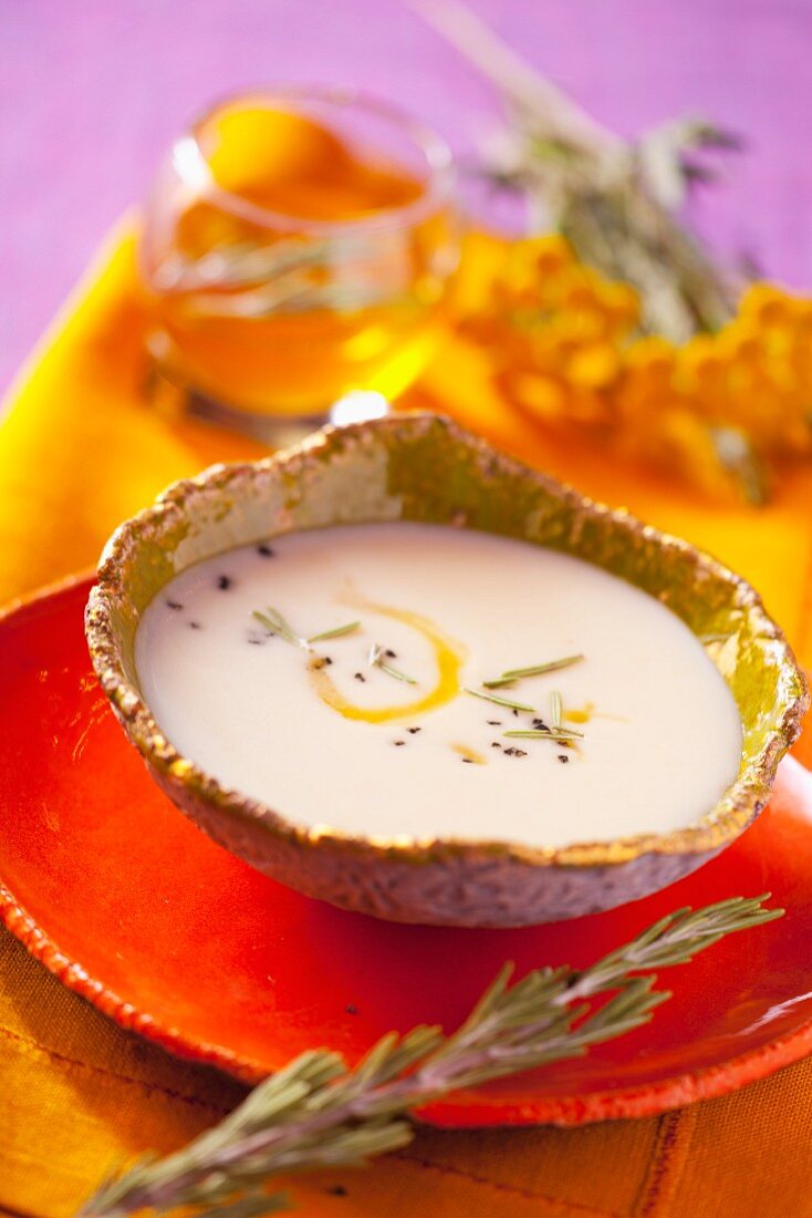 Leek cream soup with olive oil and rosemary