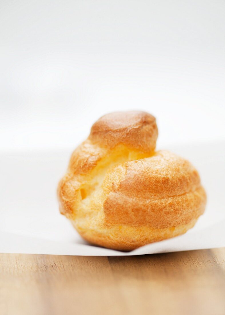 Mini cream puff on parchment paper