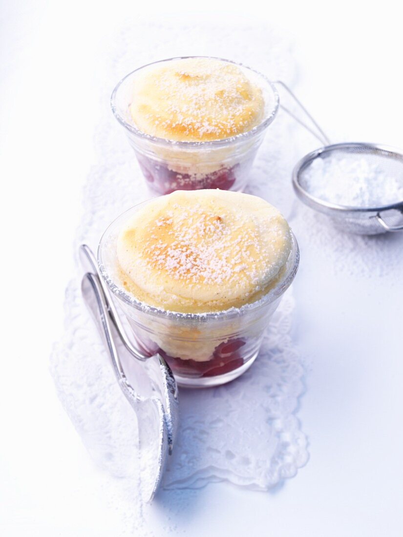 Cherry souffles with powdered sugar