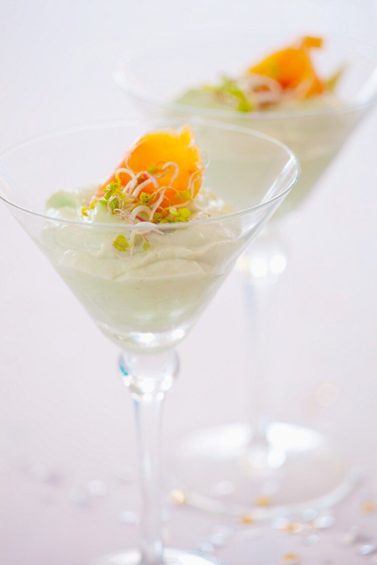 Avocado mousse with edible shoots and smoked salmon