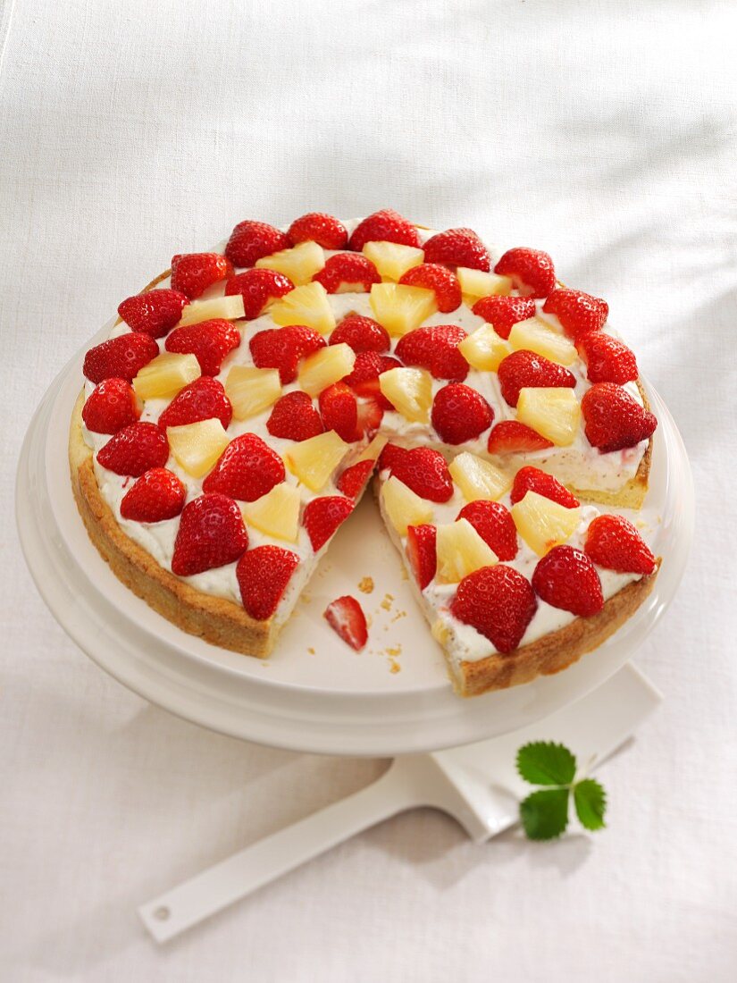 Quark cake with pineapple and strawberries
