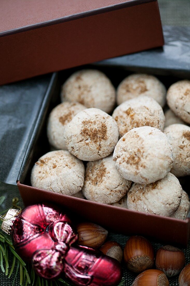 Gingerbread biscuits in a cookie tin