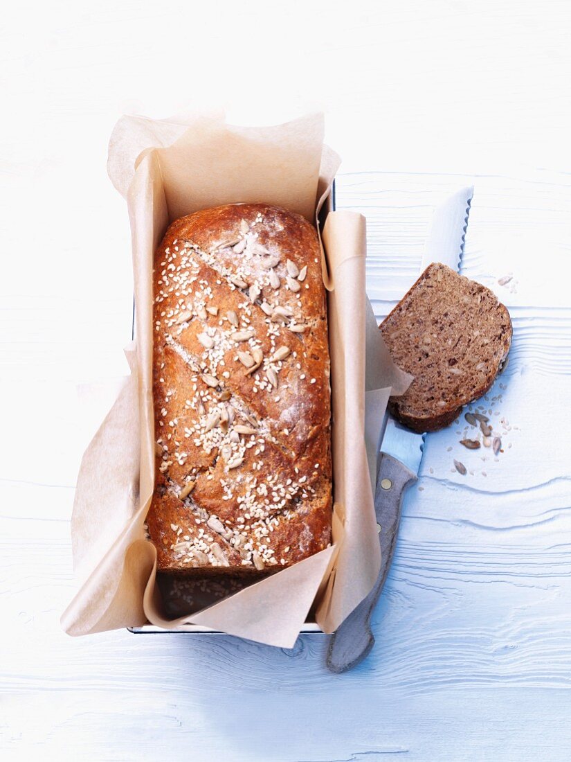 Healthy wholegrain bread in a loaf tin
