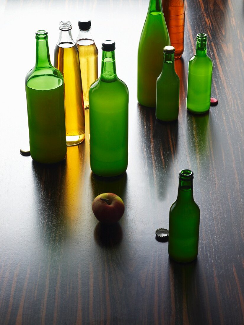 Various varieties of apple juice in bottles