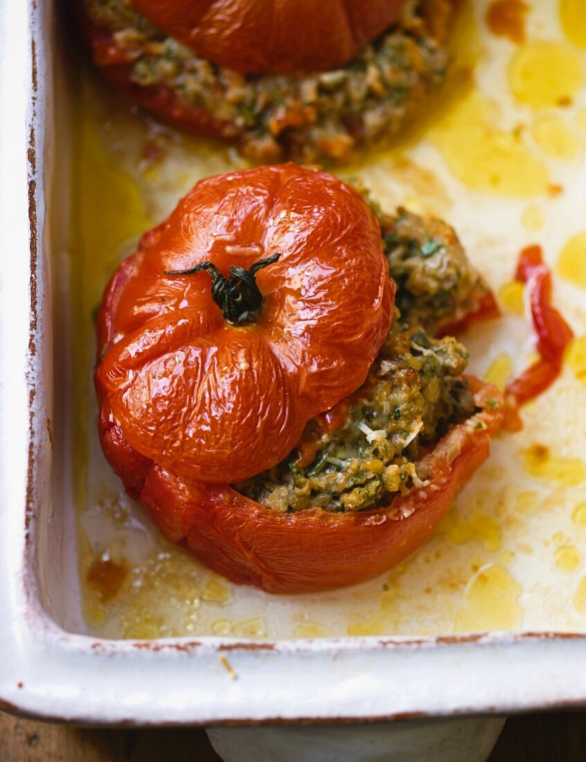 Tomatoes filled with lentils and vegetables