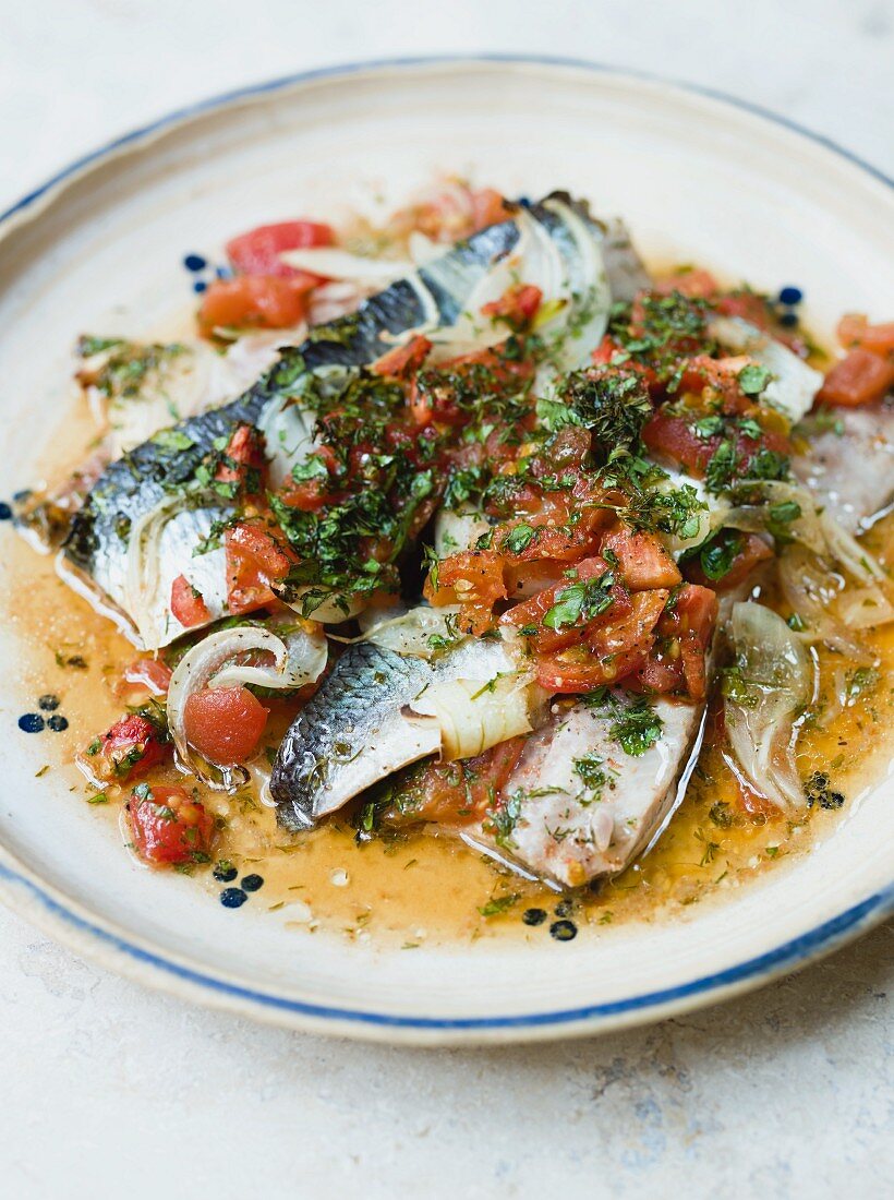 Oven-baked herrings with vinegar and tomato sauce
