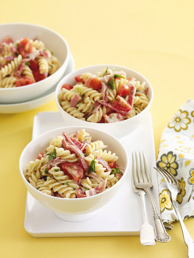 Pasta spirals with sausage and tomato