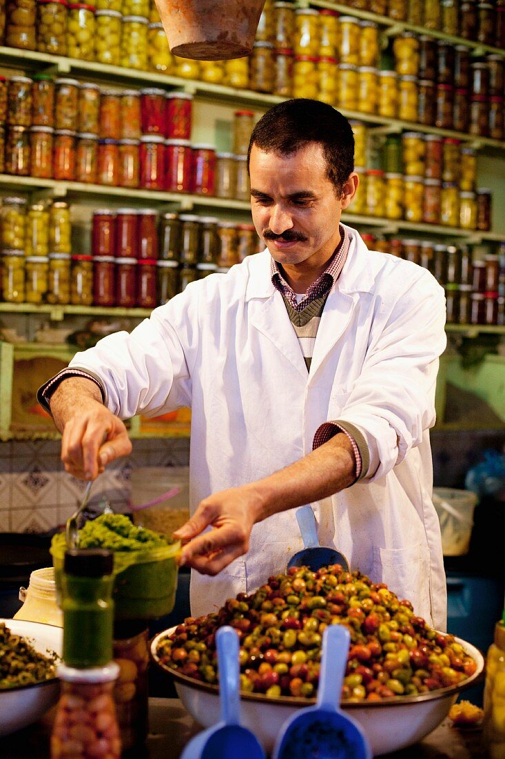A shopkeeper in a delicatessen in North Africa