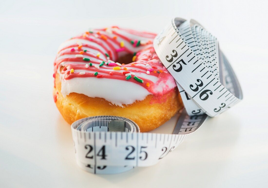 A doughnut and a measuring tape