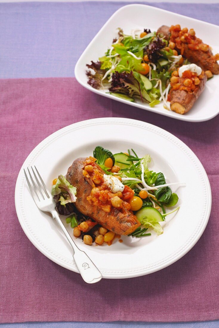 Stuffed sweet potatoes with chickpeas and side salad