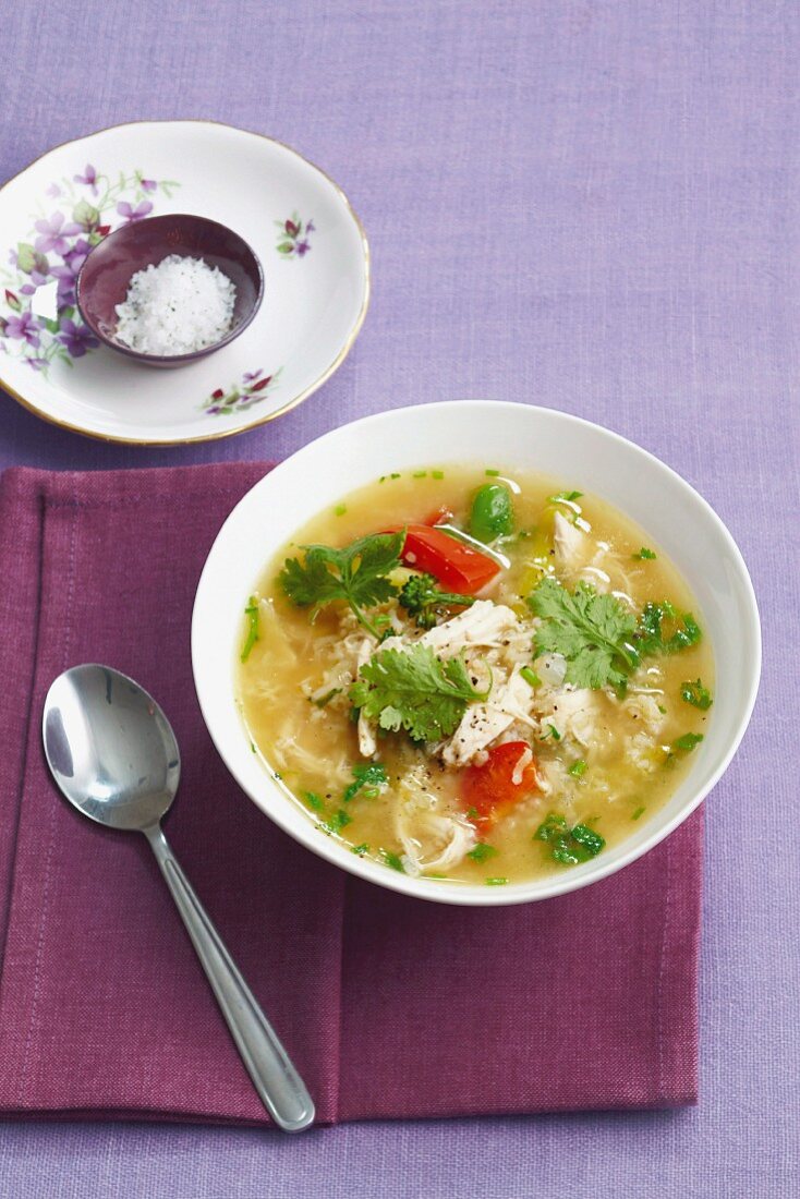 Rice soup with chicken and fresh coriander (Asia)