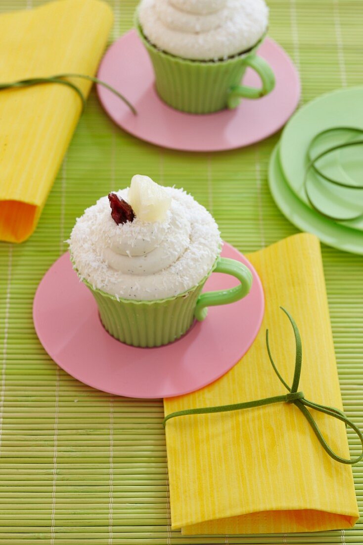 Pineapple and coconut cupcake with cranberry