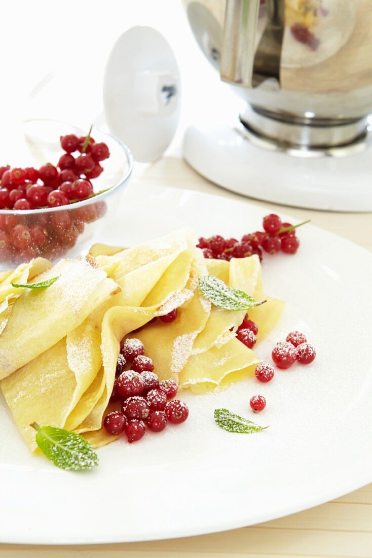 Crepes with fresh redcurrants